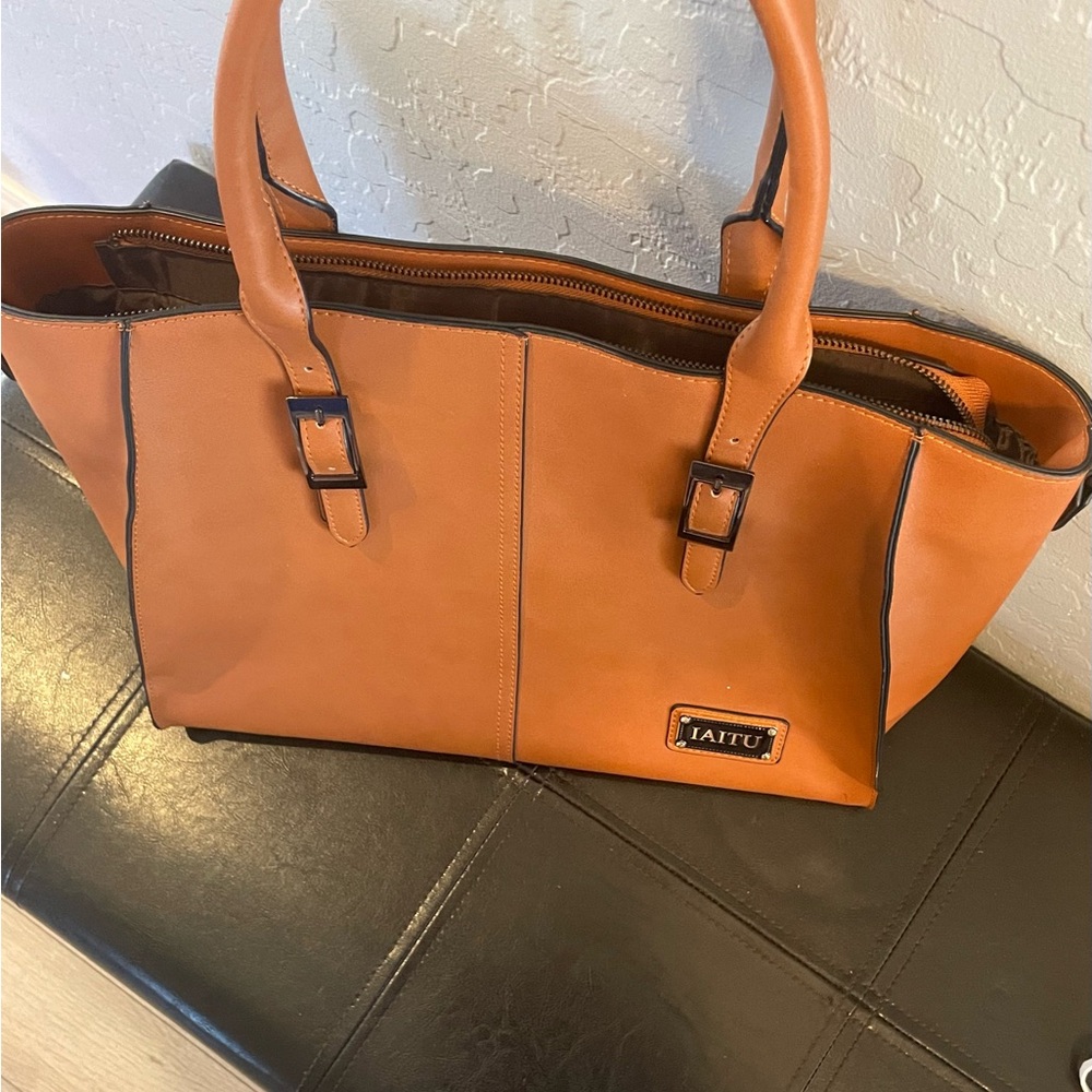 Tan designer laptop bag.